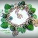 Bracciale con charms quadrifoglio e coccinella portafortuna, perle e cuori verdi