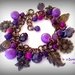 Bracciale viola con charms color bronzo a forma di foglia, gufetto, fiore, girasole