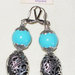 Orecchini artigianali con perle turchese a barilotti argentati