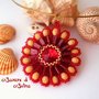 Ciondolo Fianna con Swarovski ruby tila beads mezzi cristalli crema perline rosse e oro