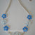 Collana con fiori in lucite