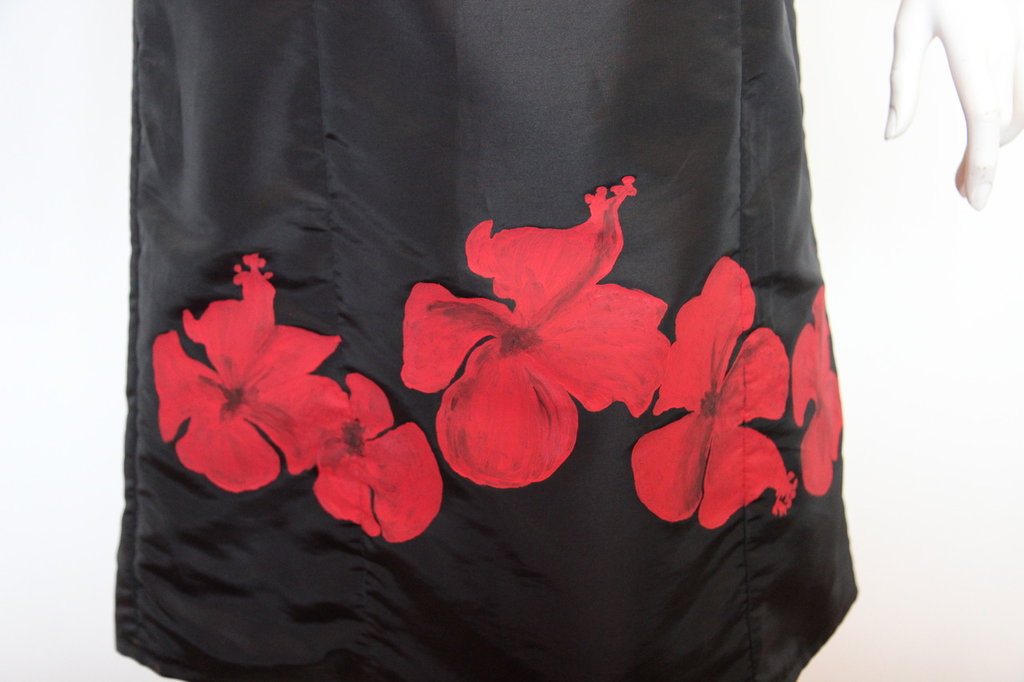 ABITO NERO CON FIORE