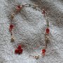 Butterfly - Collana con cristalli rossi, perle cerate color panna e mezzi cristalli