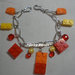 Bracciale mattoncini Lego e perline arancio