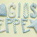 Giuseppe: nome scritto con lettere di stoffa per decorare la cameretta del tuo bambino.