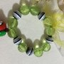 BRACCIALE BIMBA PERLE VERDI E MELINA