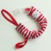 Catenella porta ciucci in cotone a strisce bianco e rosso: l'accessorio per la vostra bambina!