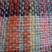Sciarpa multicolor in lana fatta al telaio