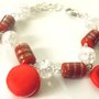 Bracciale con perle rosse in ceramica,dolcetti in fimo,perle crakle,cuore argentato nei colori del rosso idea regalo!!