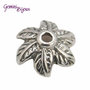 Lotto 10 coppette tibetane fiore silver 10mm.