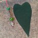 Pochette in lana cotta con cuore in panno verde