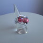 Anello in alluminio con sfere rosa cangiante