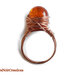anello in rame e perla arancione in vetro