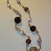 Collana realizzata a mano con nodi cinesi portafortuna e perle in resina
