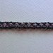 Braccialetto Crochet con catena nero e rosa