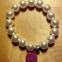 Bracciale di perle bianco con charm