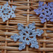 Decorazioni Natale: tris  fiocchi di neve ad uncinetto in bianco, argento e lilla