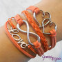 Bracciale multifile arancio scamosciato con cuori, love, infinito e treccia