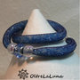 Bracciale in maglia tubolare e cristalli  di varie tonalità di azzurro