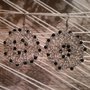 Orecchini wire crochet con perla nera 