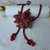 RED FLOWER STAR collana/spilla