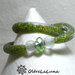 Bracciale in maglia tubolare e cristalli  di varie tonalità di verde