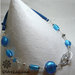 Collana con pietre azzurre in vetro e tubolare in lycra