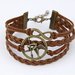 Bracciale donna uomo cuoio Hunger Games Ghiandaia imitatrice Katniss lui/lei