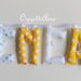ENEA: ghirlanda di lettere di stoffa imbottite per decorare la cameretta del tuo bambino in giallo e azzurro.