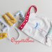 ENEA: ghirlanda di lettere di stoffa imbottite per decorare la cameretta del tuo bambino in giallo e azzurro.