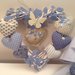 INSERZIONE RISERVATA PER VALENTINA Fiocco nascita in piquet azzurro con 5 cuori e cuore in vimini 8 cuori