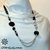 Collana con resine nere, catena in alluminio e tubolare in lycra