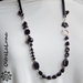 Collana con resine nere, catena in alluminio e tubolare in lycra