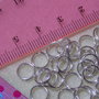 40 di anellini doppio giro mm.7×0,7 color argento lucido
