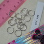 20 anellini mm.12x1 color argento lucido