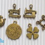 6 charms misti bronzo