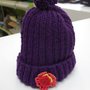 cappello bimba lana viola con pon pon e fiore