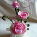 Composizione di Rose rosa all'uncinetto