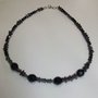 COLLANA STELLINE IN EMATITE, BICONO SWAROVSKI E CRISTALLI NERI