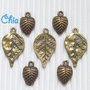 7 charms foglia in bronzo di due forme