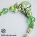 Collana con pendente in vetro verde e grappolo di perle