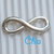 1 connettore link simbolo infinito 23x8mm