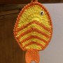 Presina gialla e arancione a forma di pesce