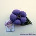 Molletta con fiore in tessuto viola