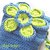Porta fazzoletti realizzato a crochet su pattern originale Silagà con fiore blu e verde, modello unico.