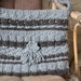 Borsa di lana a tracolla color grigia con mezzi cristalli