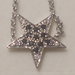Anello stella in argento 925 e Cubic Zirconia bianchi e neri.