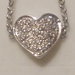 Anello cuore pavè in argento 925 e Cubic Zirconia bianchi.