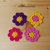 4 fiori ad uncinetto in giallo, viola, fucsia e rosa - decorazioni primavera - per feste e compleanni, applicazioni su accessori e abiti