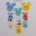 Nove (9) faccine coniglietti ad uncinetto in tre dimensioni - decorazioni primavera, Pasqua , per feste e compleanni  bambini